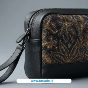 Detail kain batik motif daun, kulit sintetis, dan resleting pouch custom Tasindo